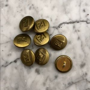 Brass Fendi buttons